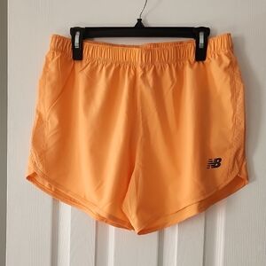 New Balance Women's Vibrant Orange Athletic Shorts